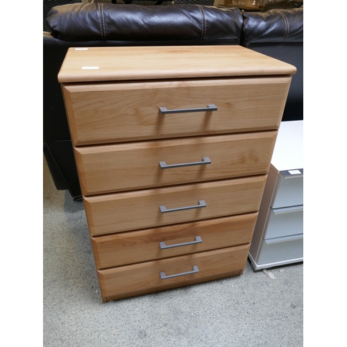 1541 - Pine effect chest of five drawers. *This lot is subject to VAT