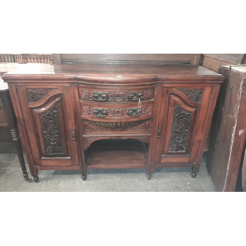 125 - An Edward VII carved walnut sideboard