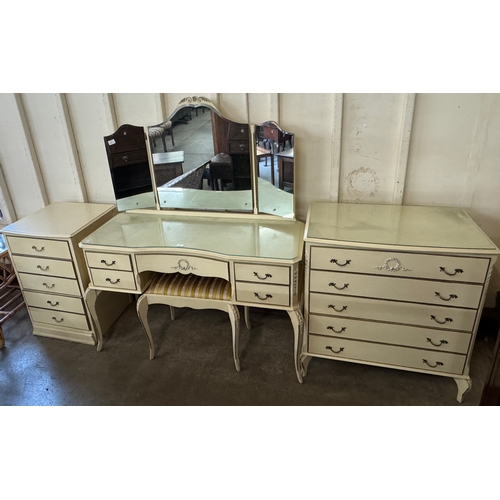 263 - A French style cream dressing table, stool and two chests of drawers