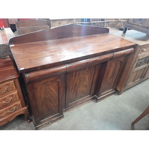 130 - An early Victorian mahogany breakfront sideboard