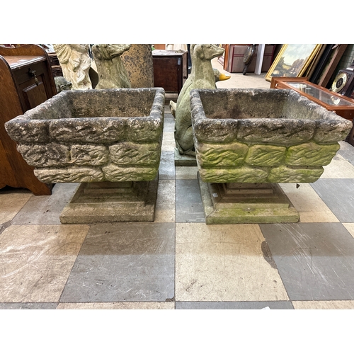 278 - A pair of square concrete garden planters