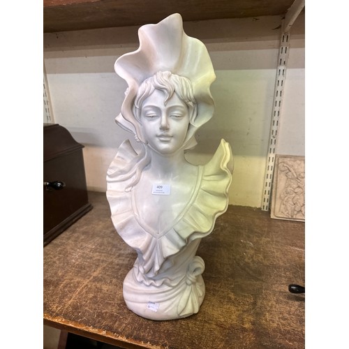 409 - An Art Nouveau style marble bust of a lady