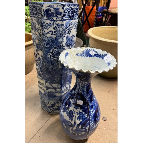 311 - A Pearlware blue and white porcelain vase and a blue and white stick stand