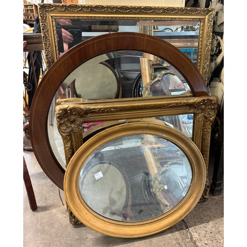 412 - An inlaid mahogany framed mirror and three gilt framed mirrors