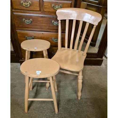 107 - A Victorian painted kitchen chair and two stools