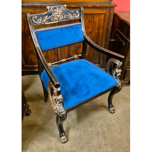 108 - A Thomas Hope style ebonised and parcel gilt elbow chair