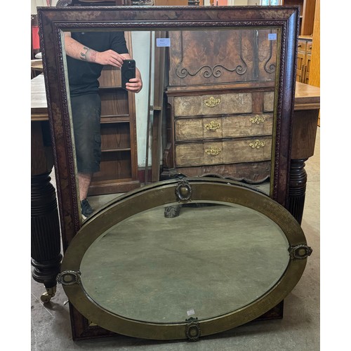 417 - A hammered brass oval framed mirror and one other