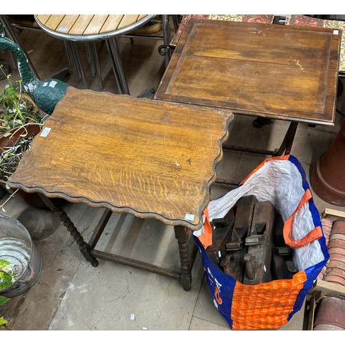 306 - An oak barelytwist occasional table, another table and vintage woodworking planes