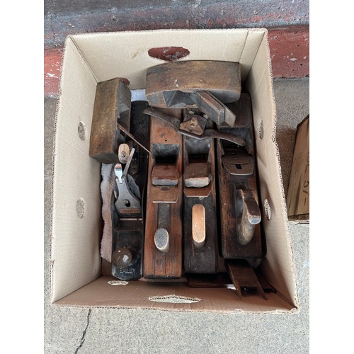 419 - A collection of vintage woodworking planes and a Westwell & Sons wooden crate