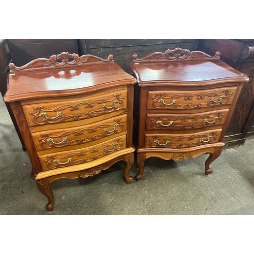 131 - A pair of French style hardwood serpentine chests