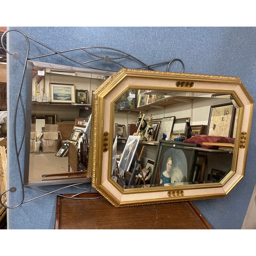 382A - A gilt framed mirror and one other