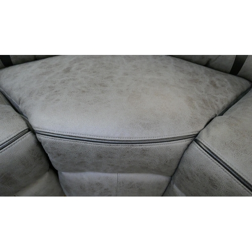 1301 - A reclining fabric and leather corner sofa with cup holders and storage console