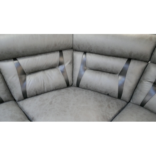 1301 - A reclining fabric and leather corner sofa with cup holders and storage console