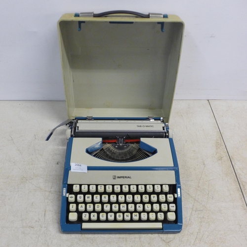 2029 - An Imperial Tab-O-Matic typewriter and a Brother Super 7300T electric typewriter