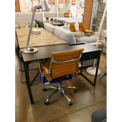 1315 - A black desk with single drawer, a Charles & Ray Eames style office chair and a Cult desk lamp