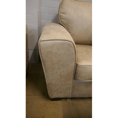 1316 - A Champagne PU suede three seater sofa, two seater sofa and armchair