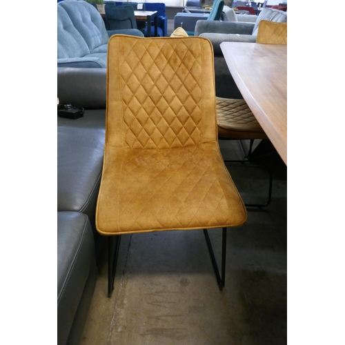 1327 - A Kay 200cm dining table and six turmeric velvet chairs *This lot is subject to VAT