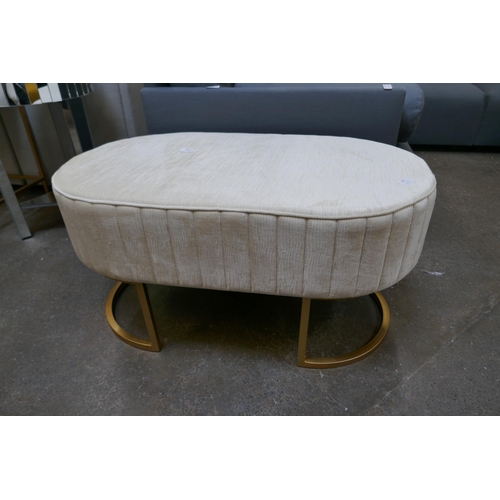 1333 - A cream upholstered stool with gold legs