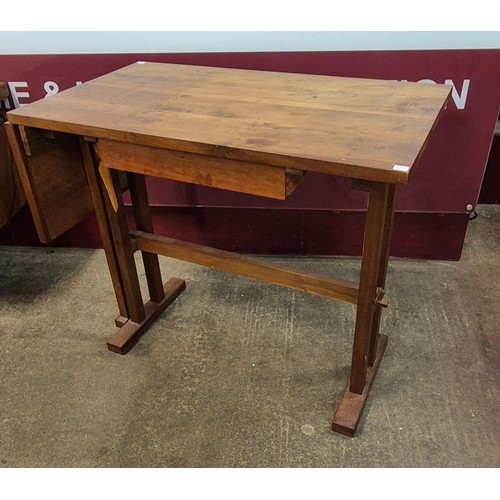 17 - A Danish style yew wood and tiled drop leaf desk