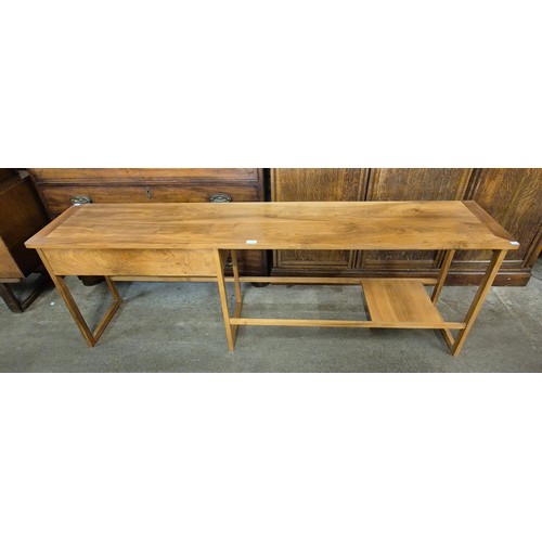 18 - A Danish style yew wood hall table