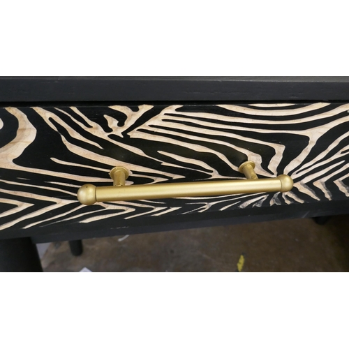 1337 - A two drawer console table with zebra design