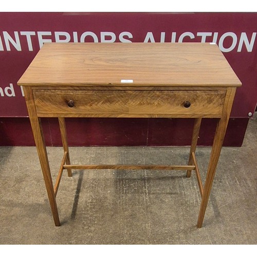 19 - A Danish style walnut single drawer side table