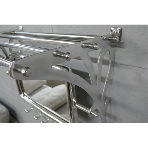 1383 - A polished chrome luggage rack