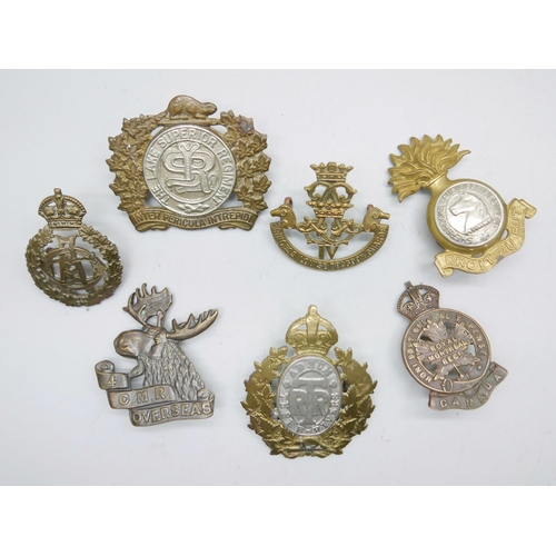 1006 - A collection of Canadian regimental cap badges including Royal Montreal, CMR overseas, Sherbrooke Fu... 