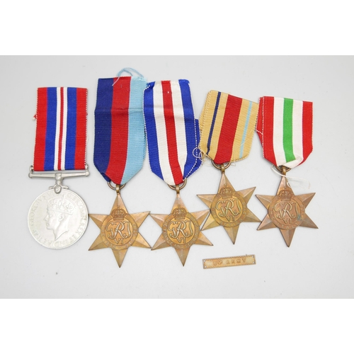 1012 - WWII medals: Africa Star with 8th Army clasp, Italy Star, France and Germany Star, 1939-1945 Star an... 