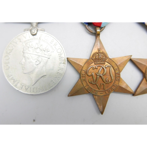 1012 - WWII medals: Africa Star with 8th Army clasp, Italy Star, France and Germany Star, 1939-1945 Star an... 