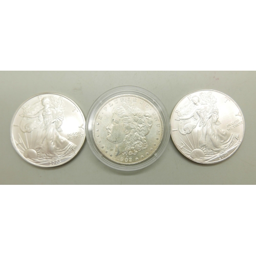 1013 - Two silver Liberty one dollar coins - 2001 and 2005, and a 1902 silver dollar