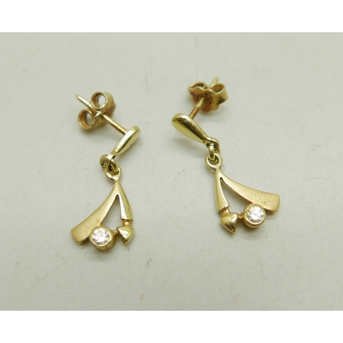 1016 - A pair of yellow metal earrings set with white stones, the butterflies marked 585, 2.7g