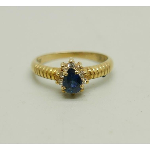 1019 - An 18ct gold, sapphire and white topaz ring, 2.6g, N