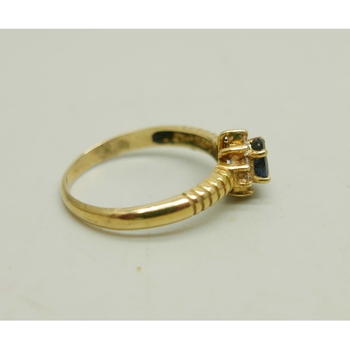 1019 - An 18ct gold, sapphire and white topaz ring, 2.6g, N