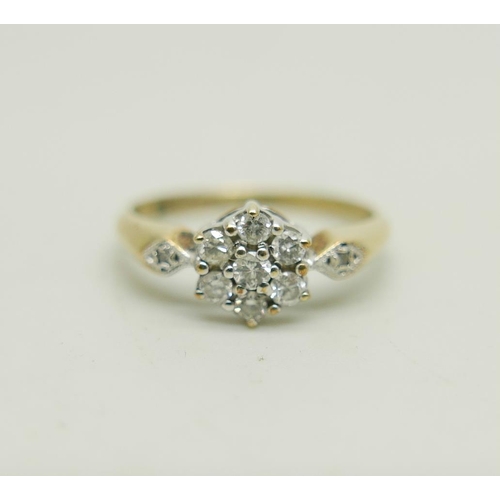 1030 - A 9ct gold and diamond cluster ring, 1.6g, L