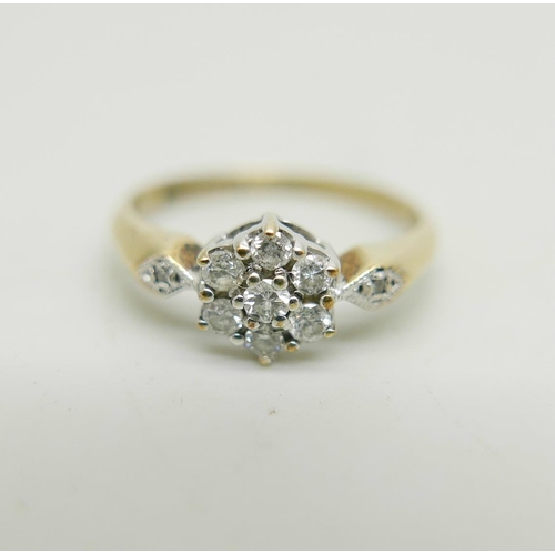 1030 - A 9ct gold and diamond cluster ring, 1.6g, L