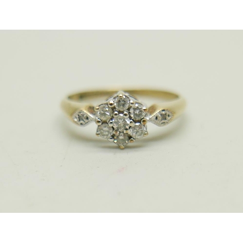 1030 - A 9ct gold and diamond cluster ring, 1.6g, L