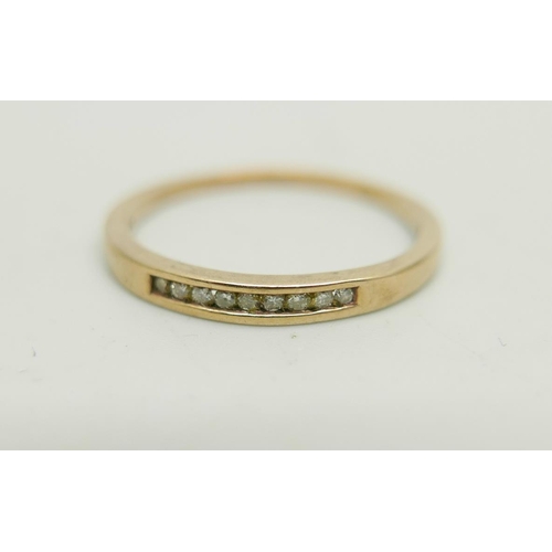 1031 - A 9ct gold ring set with small diamonds, 1.8g, R