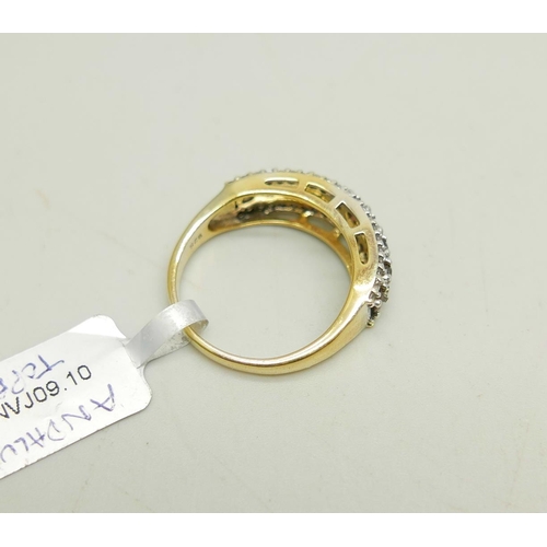 1032 - A silver gilt andalusite and topaz three row ring, U