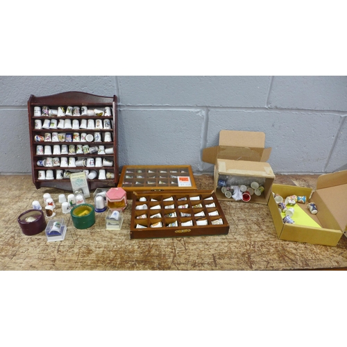 1045 - A box of mainly china thimbles, thimble display stands, some boxed **PLEASE NOTE THIS LOT IS NOT ELI... 