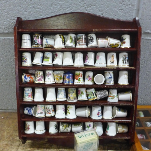 1045 - A box of mainly china thimbles, thimble display stands, some boxed **PLEASE NOTE THIS LOT IS NOT ELI... 