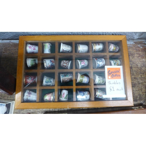 1045 - A box of mainly china thimbles, thimble display stands, some boxed **PLEASE NOTE THIS LOT IS NOT ELI... 