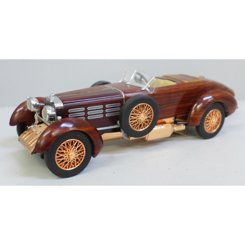 1050 - A Franklin Mint 1924 Hispano-Swiza tulipwood vintage model vehicle with certificate in polystyrene b... 