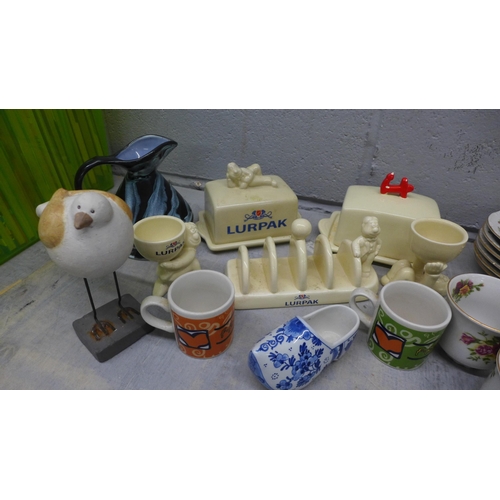 1052 - A collection of china including Lurpak toast rack, egg cups and butter dish, a Thun Czech floral tea... 