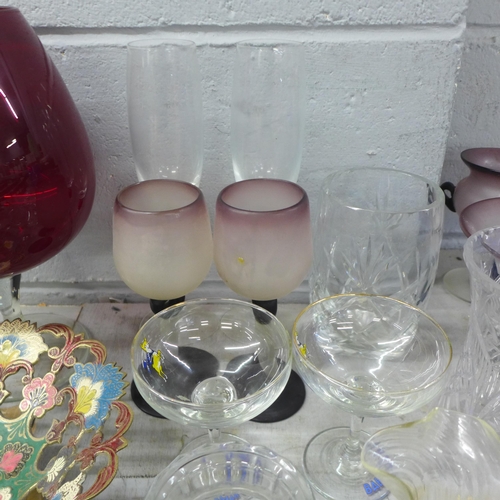 1055 - A collection of glassware including two Babycham glasses, a set of hand blown studio glass, paperwei... 