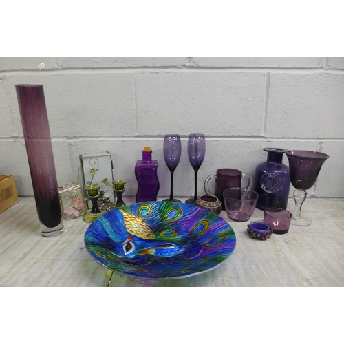 1059 - A collection of amethyst glass and dressing table items including trinket boxes and perfume bottles,... 