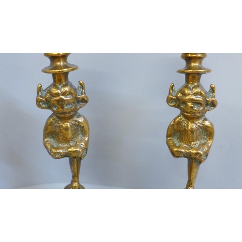 626 - A pair of copper Lincoln Imp candlesticks