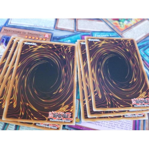 653 - Approximately 3600 Yu-Gi-Oh cards, first editions including rares
