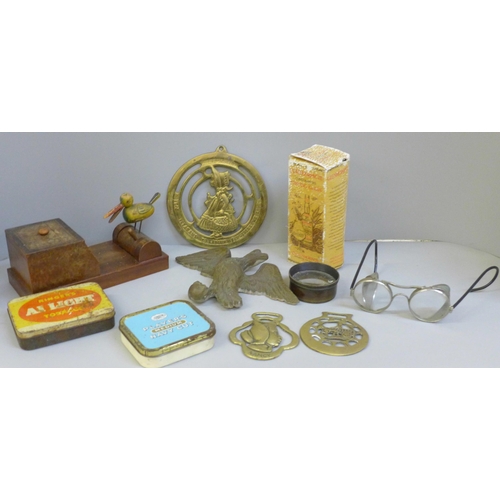 662 - A novelty bird cigarette dispenser, vintage British motorcycle goggles, an antique brass lens, a Gle... 