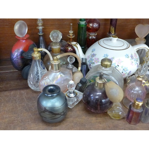 678 - A collection of approximately 40 perfume bottles and an Arthur Wood teapot **PLEASE NOTE THIS LOT IS... 